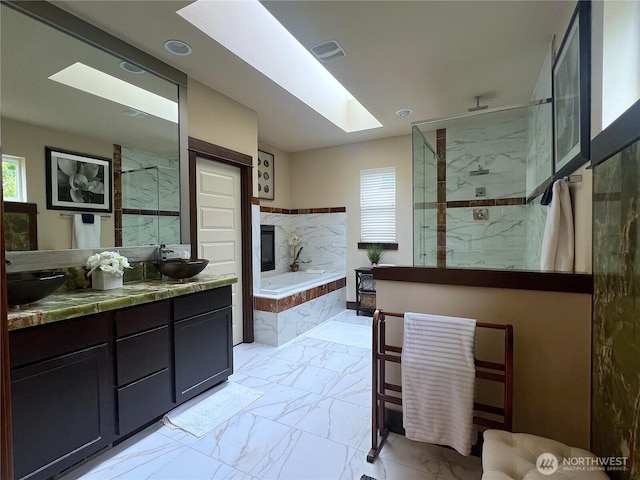 2805 93rd Pl SE, Everett, WA 98208 - bathroom featuring a skylight, plenty of natural light, marble finish floors, a marble finish shower, and recessed lighting