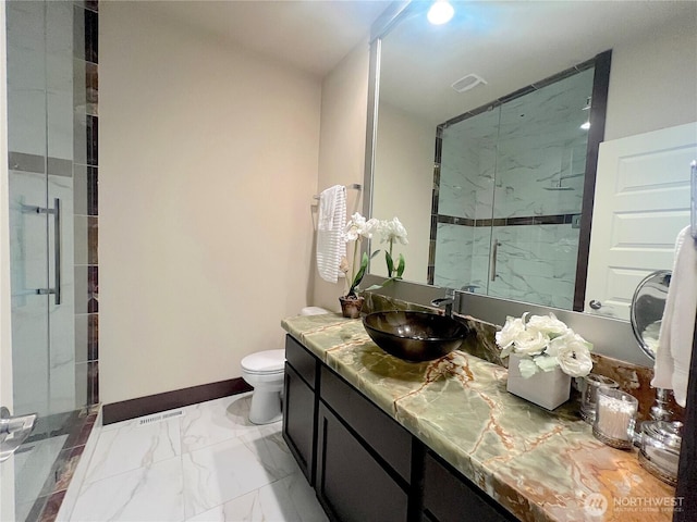 2805 93rd Pl SE, Everett, WA 98208 - full bath with a shower stall, marble finish floors, toilet, vanity, and baseboards