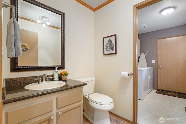 13218 42nd Ave W, Mukilteo, WA 98275 - half bathroom with washer and dryer, toilet, and vanity
