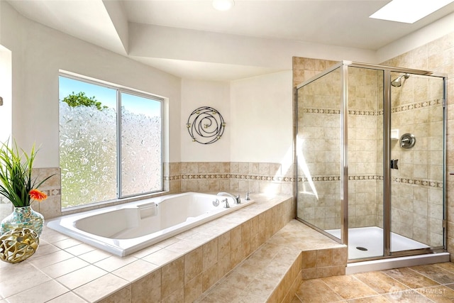 13218 42nd Ave W, Mukilteo, WA 98275 - bathroom featuring a garden tub, a shower stall, and a skylight