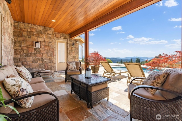 1844 Vineyard Pl, Bellingham, WA 98226 - view of patio with a mountain view, an outdoor hangout area, and an outdoor pool