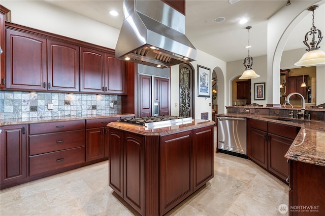 1844 Vineyard Pl, Bellingham, WA 98226 - kitchen with island range hood, stainless steel appliances, arched walkways, and reddish brown cabinets