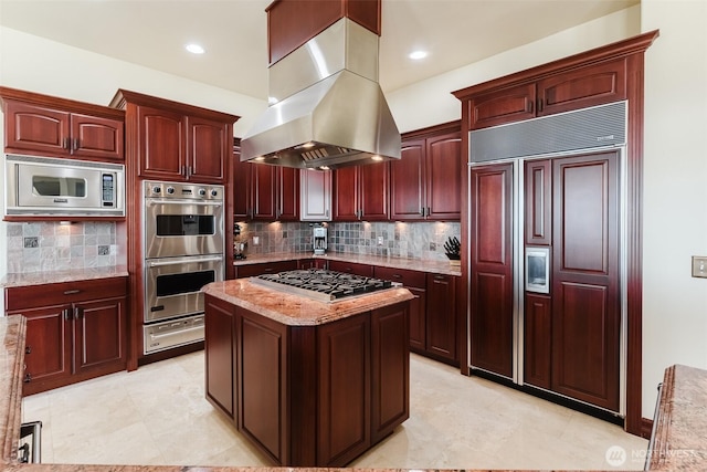 1844 Vineyard Pl, Bellingham, WA 98226 - kitchen featuring island range hood, built in appliances, a warming drawer, tasteful backsplash, and recessed lighting