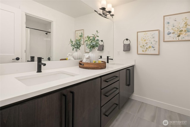10207 NE 136th Pl, Lot, Kirkland, WA 98034 - bathroom featuring double vanity and baseboards