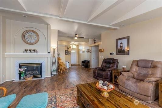 30350 Deer Meadows Rd E, Deer Meadows, WA 99122 - living area featuring wood finished floors, a fireplace, and ceiling fan