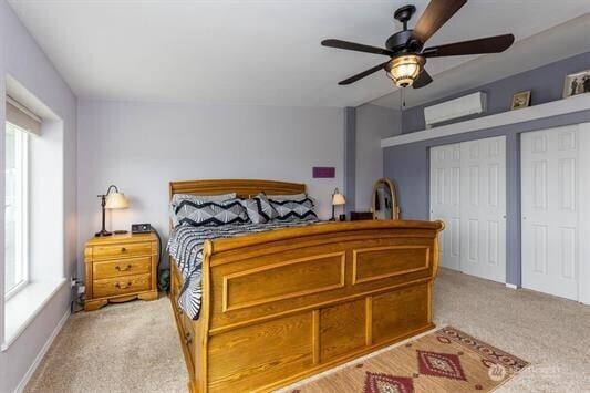 30350 Deer Meadows Rd E, Deer Meadows, WA 99122 - bedroom with multiple windows, light colored carpet, and a wall unit AC