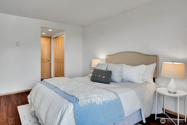 1605 5th Ave N Unit 402, Seattle, WA 98109 - bedroom with baseboards, wood finished floors, and recessed lighting