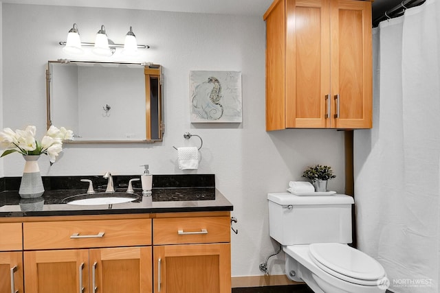 1605 5th Ave N Unit 402, Seattle, WA 98109 - bathroom featuring toilet and vanity