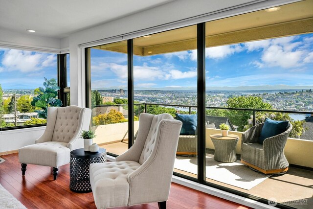 1605 5th Ave N Unit 402, Seattle, WA 98109 - sitting room with wood finished floors and recessed lighting