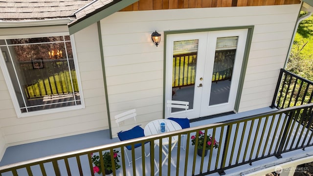 3120 Wave Dr, Everett, WA 98203 - entrance to property with french doors and roof with shingles