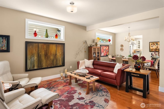 1032 76th Ave NE, Lake Stevens, WA 98258 - living room with a chandelier and wood finished floors