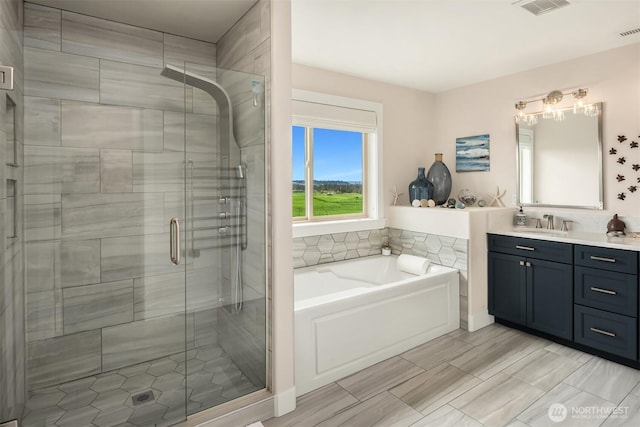 1032 76th Ave NE, Lake Stevens, WA 98258 - full bath with vanity, a bath, and a stall shower