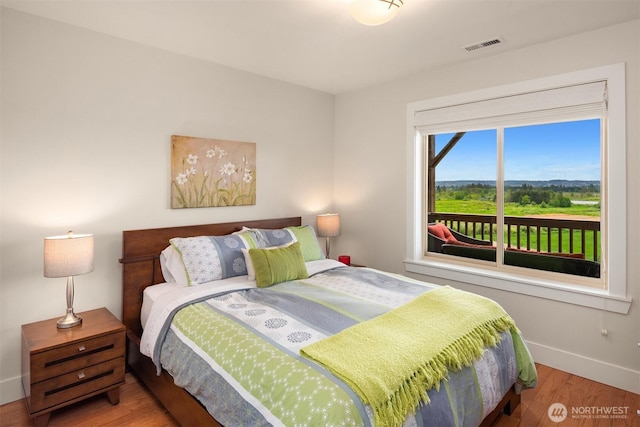 1032 76th Ave NE, Lake Stevens, WA 98258 - bedroom with baseboards and wood finished floors
