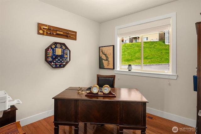 1032 76th Ave NE, Lake Stevens, WA 98258 - office area featuring baseboards and wood finished floors