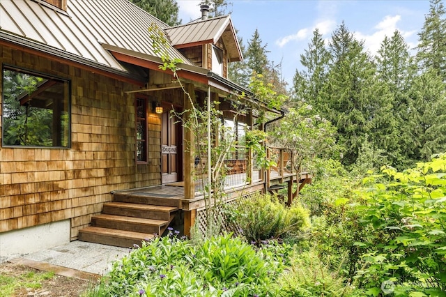 5092 Ribbit Rd, Langley, WA 98260 - view of exterior entry featuring a standing seam roof and metal roof