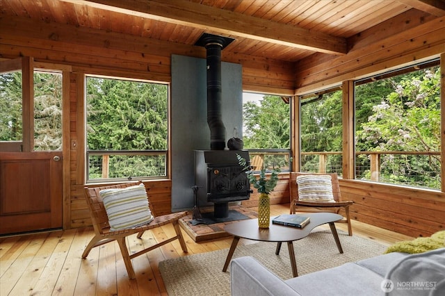 5092 Ribbit Rd, Langley, WA 98260 - sunroom with a wood stove and beam ceiling