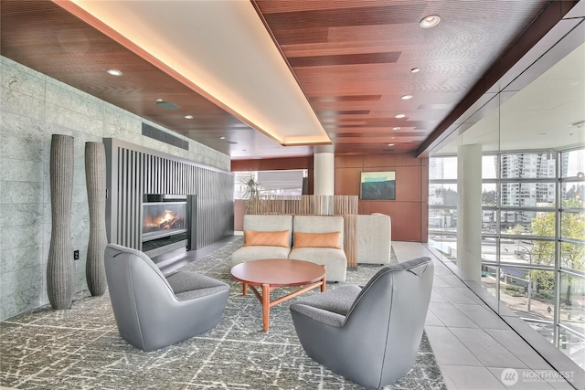 10700 NE 4th St Unit 1006, Bellevue, WA 98004 - community lobby with wooden ceiling, recessed lighting, and a wall of windows