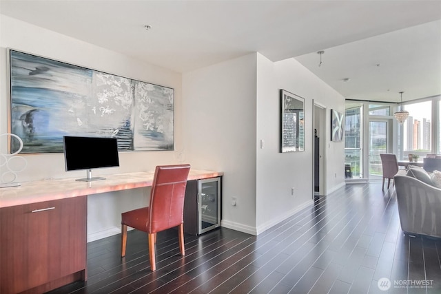 10700 NE 4th St Unit 1006, Bellevue, WA 98004 - office space featuring dark wood-style floors, baseboards, and beverage cooler
