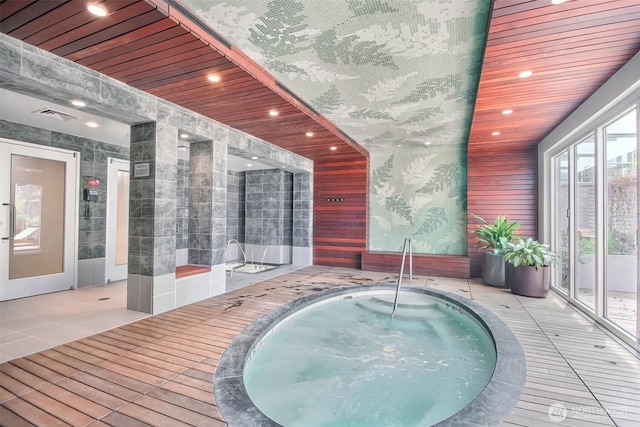 10700 NE 4th St Unit 1006, Bellevue, WA 98004 - view of pool featuring a hot tub and a pool