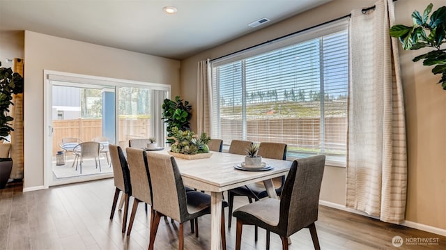 17916 139th Pl E, Puyallup, WA 98374 - dining room with wood finished floors, baseboards, and recessed lighting