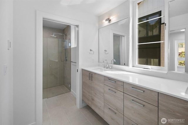 118E 2nd Ave S, Kirkland, WA 98033 - bathroom featuring vanity, a stall shower, tile patterned floors, and baseboards