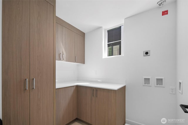 118E 2nd Ave S, Kirkland, WA 98033 - laundry area with electric dryer hookup, cabinet space, and baseboards