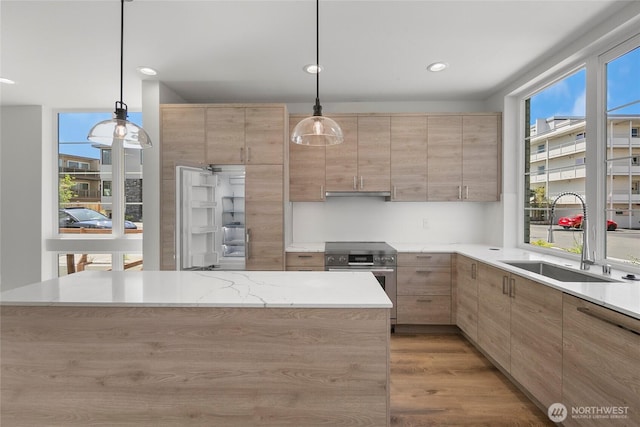 118E 2nd Ave S, Kirkland, WA 98033 - kitchen with a sink, wood finished floors, light brown cabinets, and recessed lighting