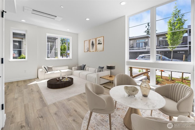 118E 2nd Ave S, Kirkland, WA 98033 - living room featuring wood finished floors, recessed lighting, and baseboards