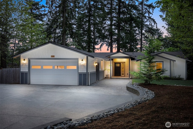 7429 NE 129th St, Kirkland, WA 98034 - ranch-style house with driveway and an attached garage