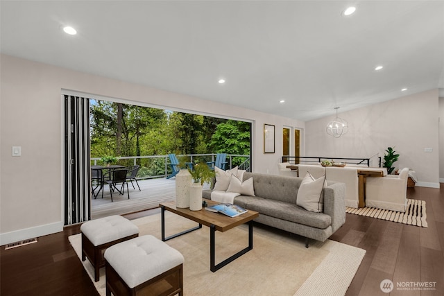 7429 NE 129th St, Kirkland, WA 98034 - living area featuring plenty of natural light, wood finished floors, a chandelier, recessed lighting, and baseboards