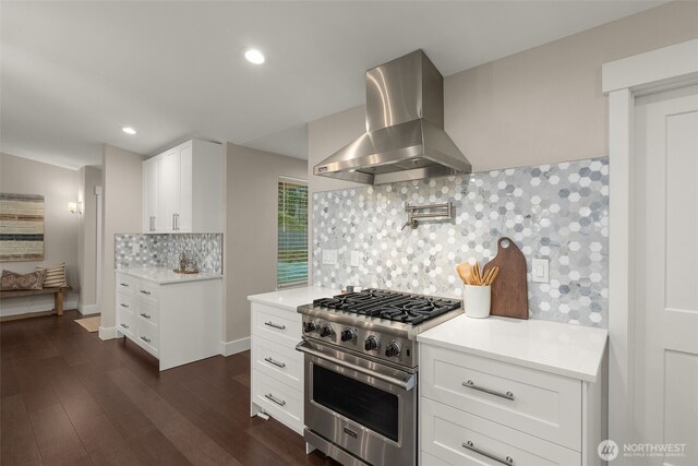 7429 NE 129th St, Kirkland, WA 98034 - kitchen featuring high end stainless steel range, extractor fan, light countertops, decorative backsplash, and recessed lighting