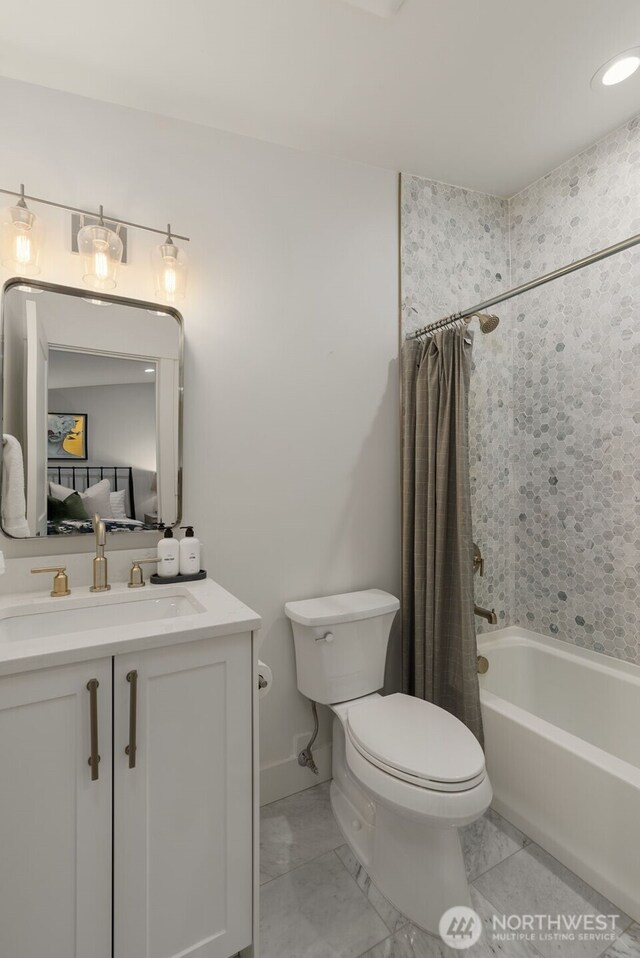 7429 NE 129th St, Kirkland, WA 98034 - bathroom featuring toilet, vanity, shower / bath combination with curtain, and connected bathroom