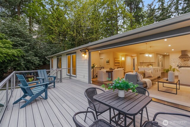7429 NE 129th St, Kirkland, WA 98034 - wooden deck with outdoor dining space
