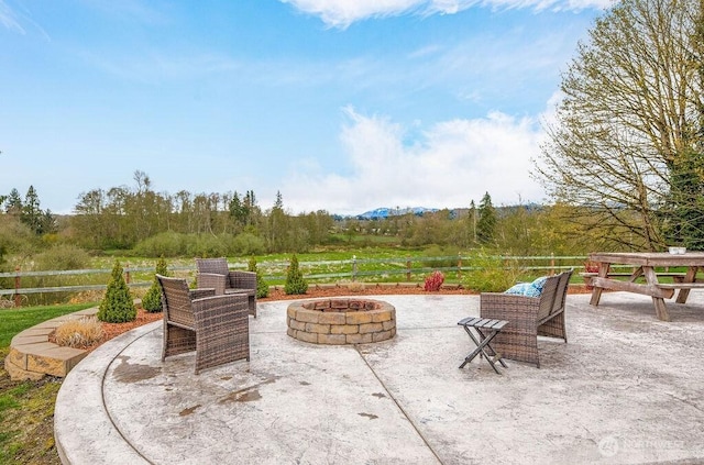 2217 200th St NE, Arlington, WA 98223 - view of patio with an outdoor fire pit