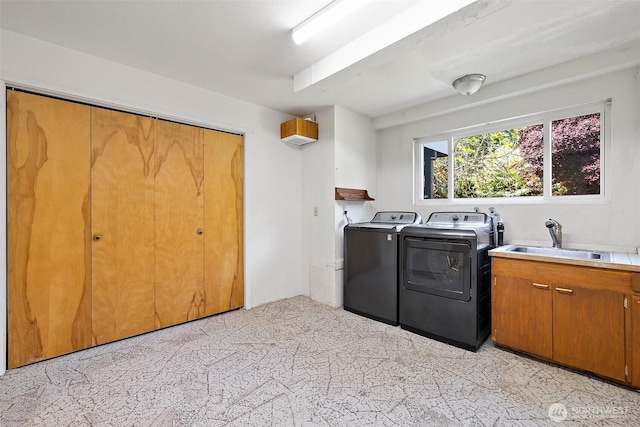 laundry area with washer and clothes dryer