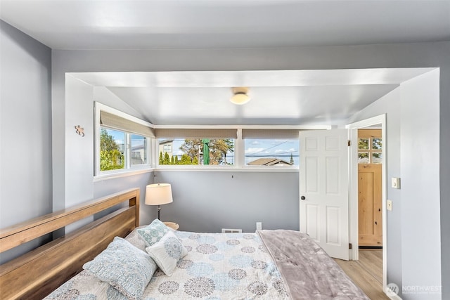 232 N Sunset Dr, Camano Island, WA 98282 - bedroom with wood finished floors and lofted ceiling