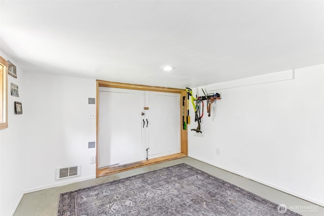 232 N Sunset Dr, Camano Island, WA 98282 - foyer entrance featuring recessed lighting, baseboards, and concrete floors