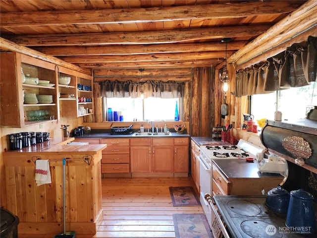 266 Bluebell Ln, Tonasket, WA 98855 - kitchen with a sink, white gas stove, light wood-style floors, tile countertops, and wood ceiling with exposed beams