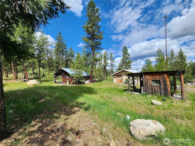 266 Bluebell Ln, Tonasket, WA 98855 - view of yard with an outdoor structure