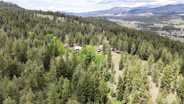266 Bluebell Ln, Tonasket, WA 98855 - bird's eye view of a heavily wooded area and mountains