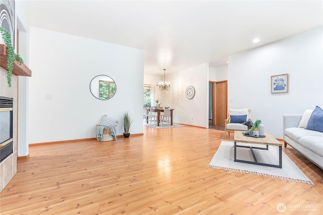 26 Inglewood Pl, Bellingham, WA 98229 - living room featuring a chandelier, light wood-style floors, recessed lighting, and baseboards