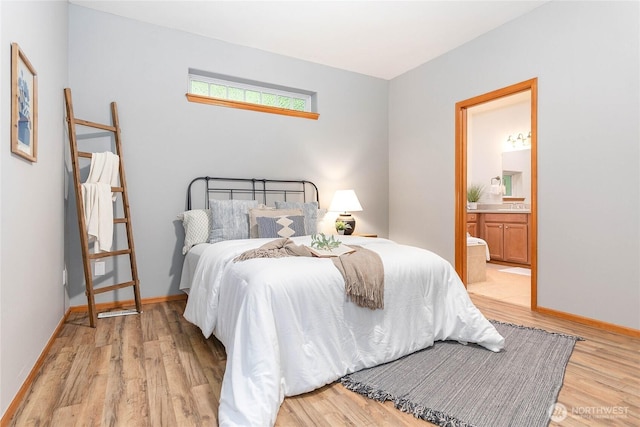 26 Inglewood Pl, Bellingham, WA 98229 - bedroom featuring light wood finished floors, connected bathroom, and baseboards