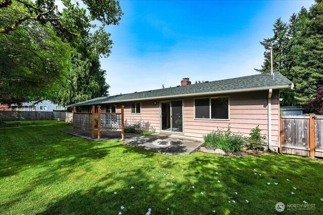 21918 83rd Ave W, Edmonds, WA 98026 - back of house featuring a patio and a chimney