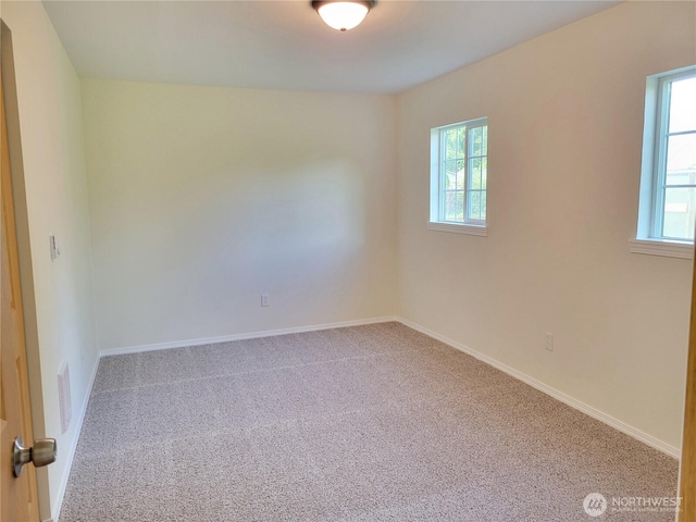 2917 Tierney St SW, Olympia, WA 98512 - carpeted spare room with healthy amount of natural light and baseboards