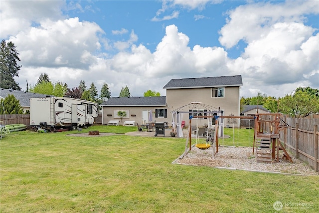 307 E Wilson St, Yacolt, WA 98675 - rear view of house featuring a gazebo, a patio area, and a playground