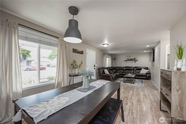 307 E Wilson St, Yacolt, WA 98675 - dining area with light wood-style floors, plenty of natural light, and baseboards