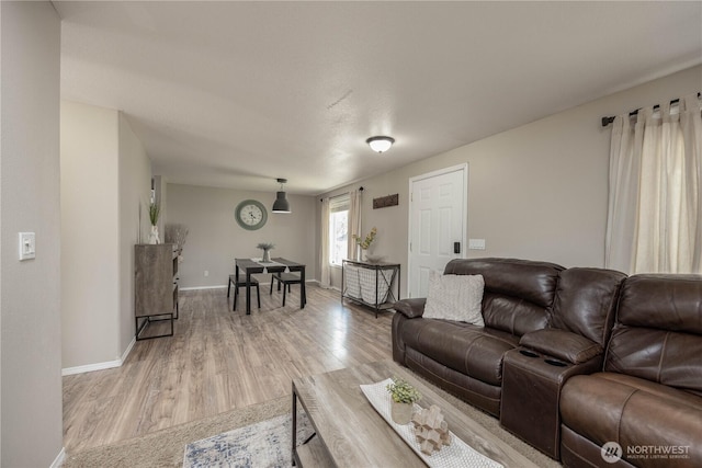 307 E Wilson St, Yacolt, WA 98675 - living area with light wood-style flooring and baseboards