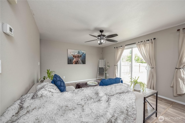 307 E Wilson St, Yacolt, WA 98675 - bedroom with baseboards, access to outside, light wood-style floors, and ceiling fan