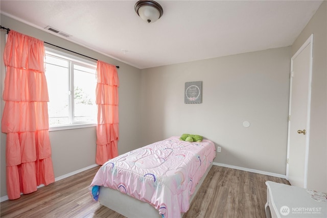 307 E Wilson St, Yacolt, WA 98675 - bedroom with wood finished floors and baseboards