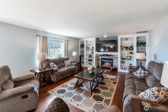 8618 196th Street Ct E, Spanaway, WA 98387 - living room with wood finished floors and a fireplace